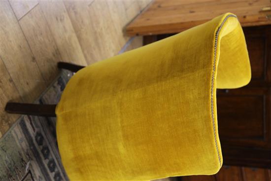 A George III wing armchair